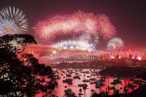 Stunning display of Sydney Fireworks lighting up the night sky, capturing the essence of New Year's Eve celebrations in Sydney.