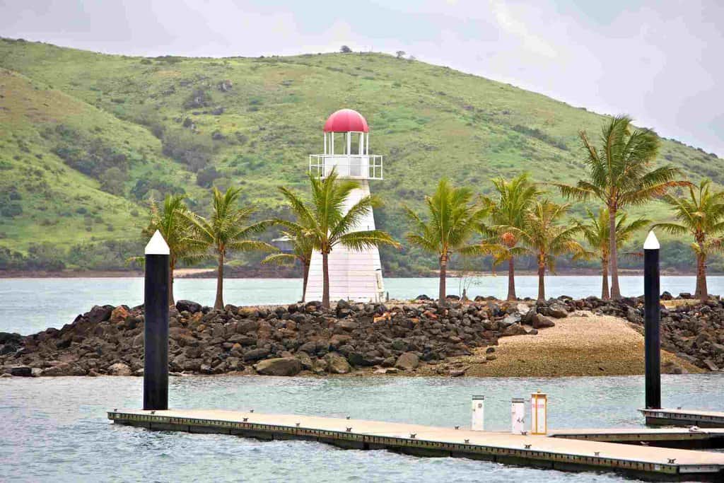 Hamilton Island harbour entrance with a lighthouse.