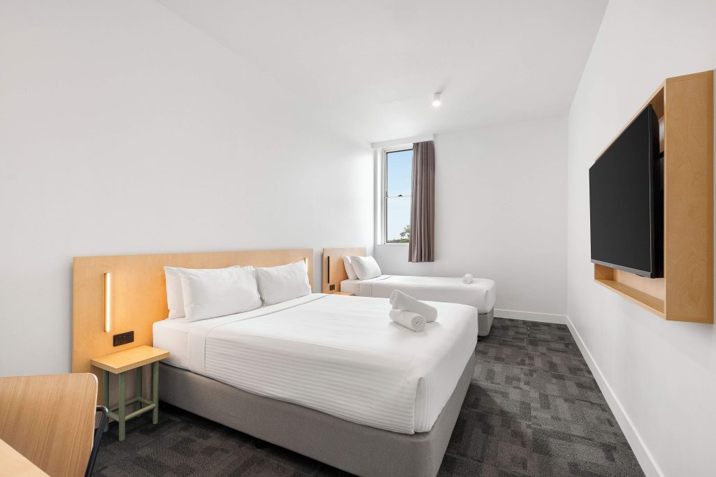 A clean and modern private twin room at Sydney Harbour YHA in The Rocks, the best budget accommodation in Circular Quay for backpackers and solo travellers exploring Sydney.